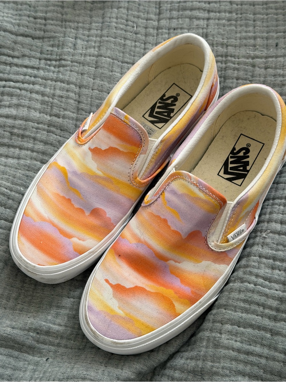 Vans Women’s Slip-On Sneakers in Orange Pink Yellow Lavender Cloud Print
